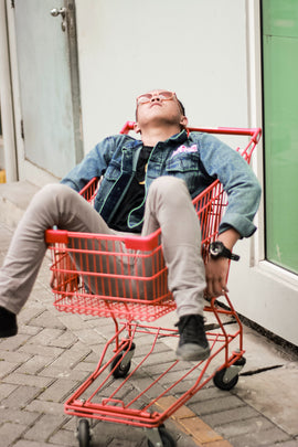 Tired Man in a Shopping Trolley