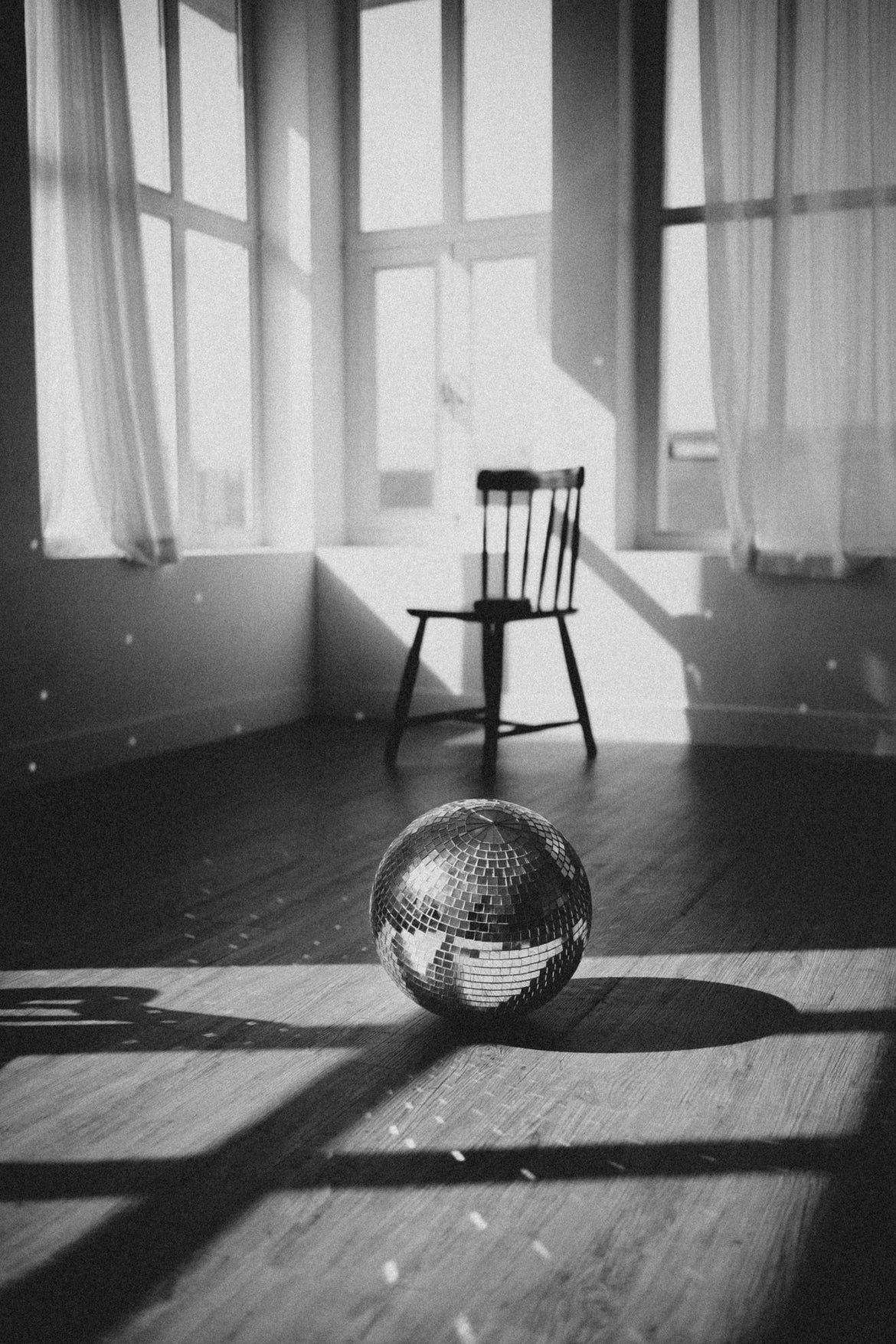 Empty Room Chair and Disco Ball